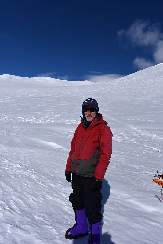 12B Jerome Enjoying A Rest Day At Mount Vinson High Camp With The Start Of The Route To the Summit Behind